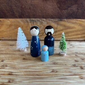 Handcrafted Wooden Family Figurine Set with Trees